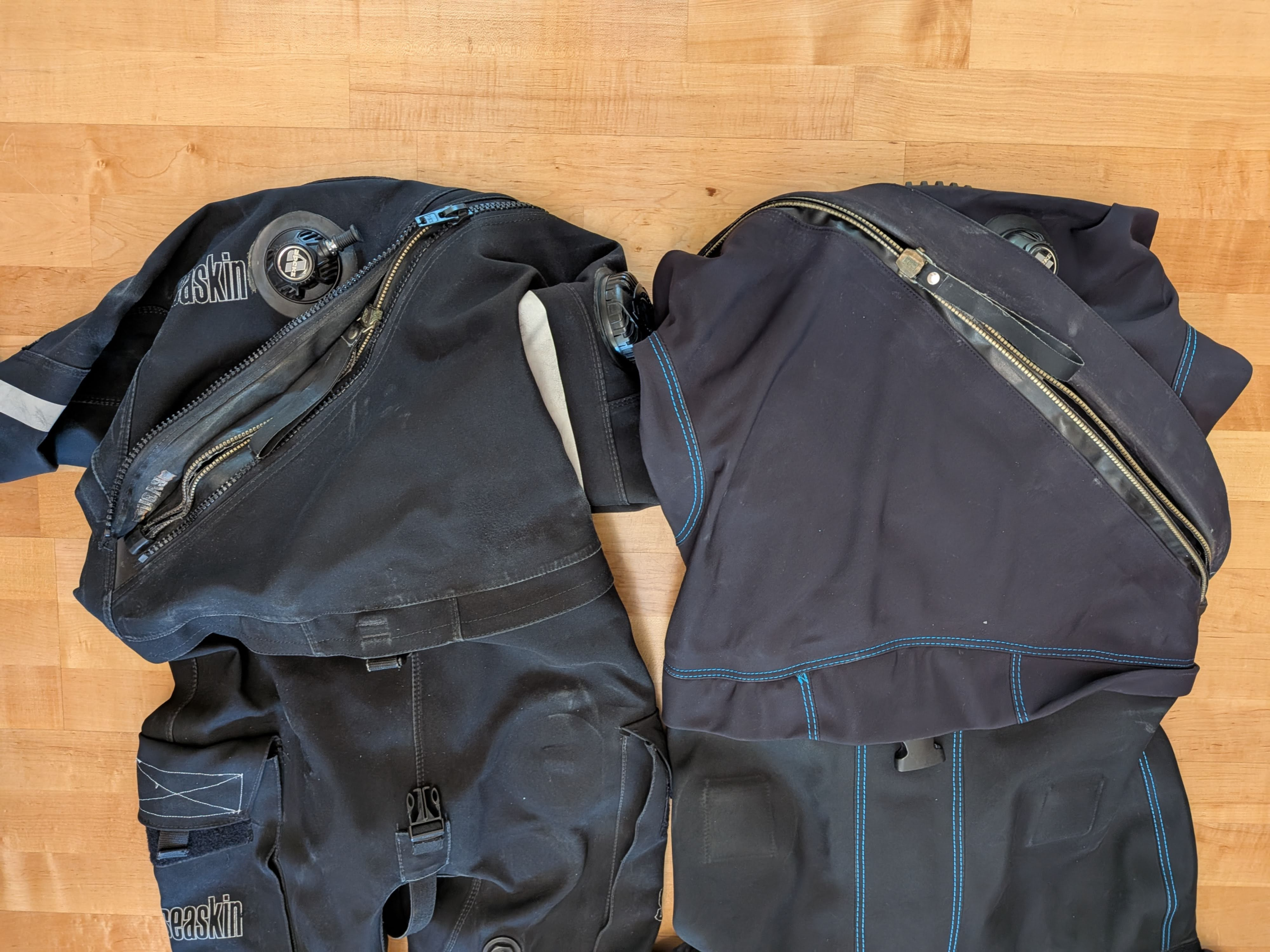 Seaskin Nova dual diagonal zipper and O'Three 90Ninety single diagonal zipper side by side